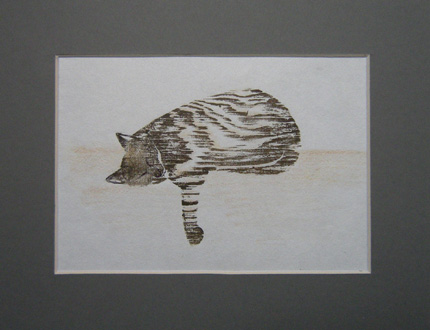 Sleeping cat woodcut